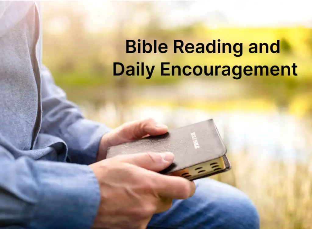 Person holding a Bible outdoors, promoting daily encouragement through Bible reading.