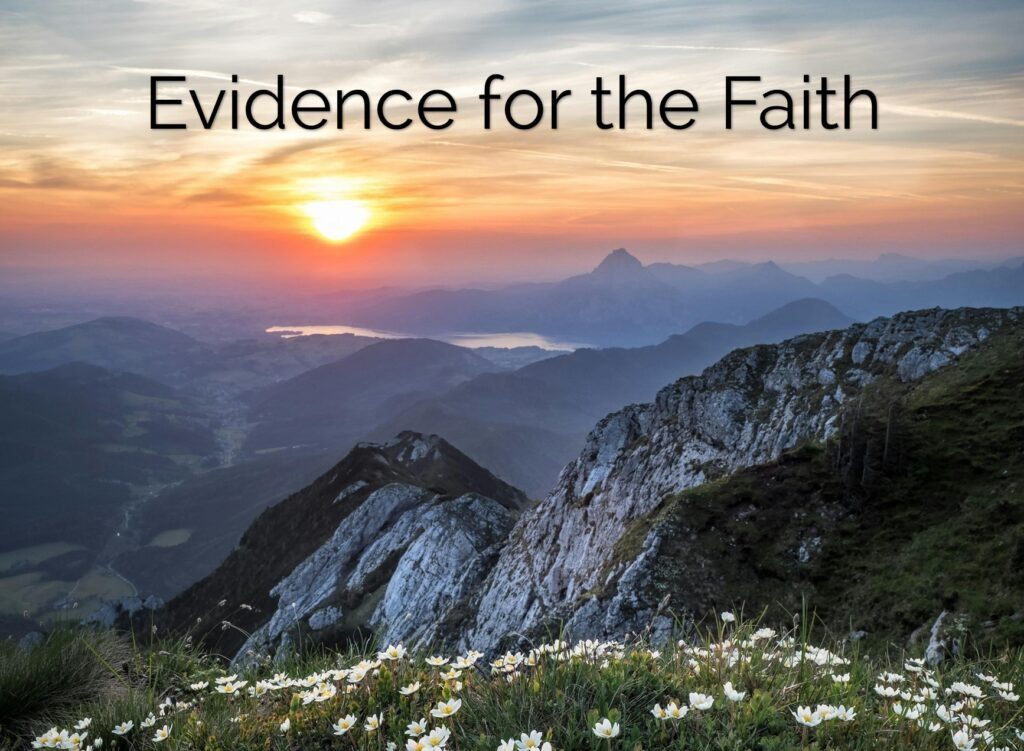 Dawn over mountains with inspirational text