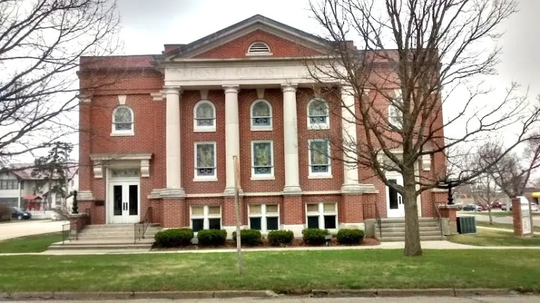 Red brick building with large pillars